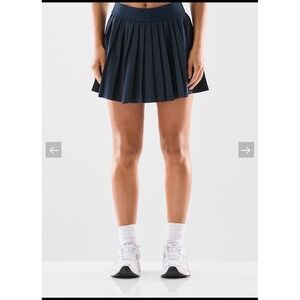 TNA movetech Tennis Skirt with Built-in‎ Shorts Navy Blue Pleated Athleisure XS